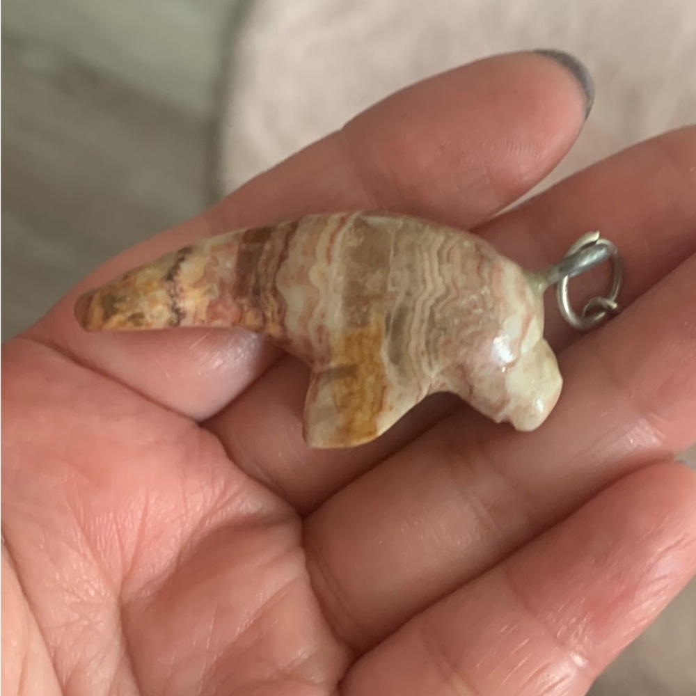 Stone manatee key holder ( if you buy multiple, I can give discount)